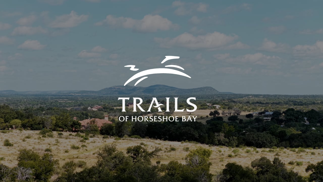 Aerial view of The Trails of Horseshoe Bay across Hill Country terrain