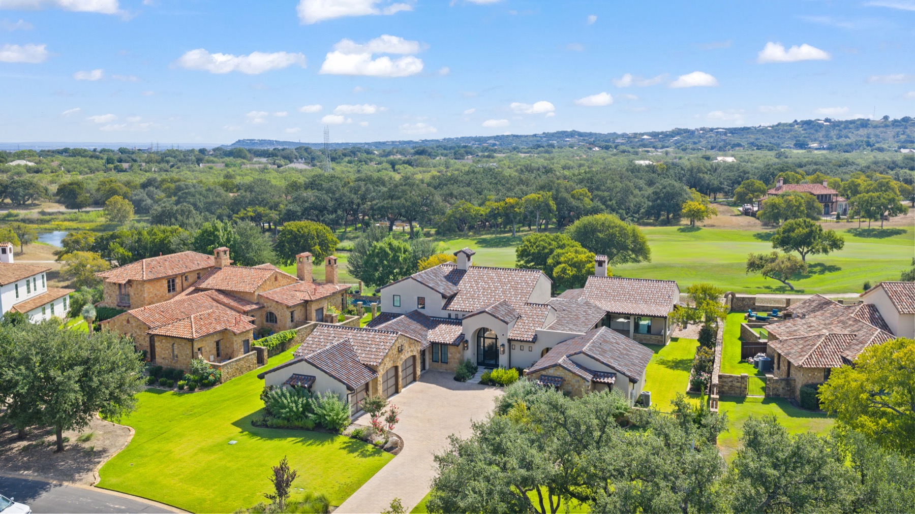 Aerial photograph showing a Central Texas home in relation to its land and neighboring properties.