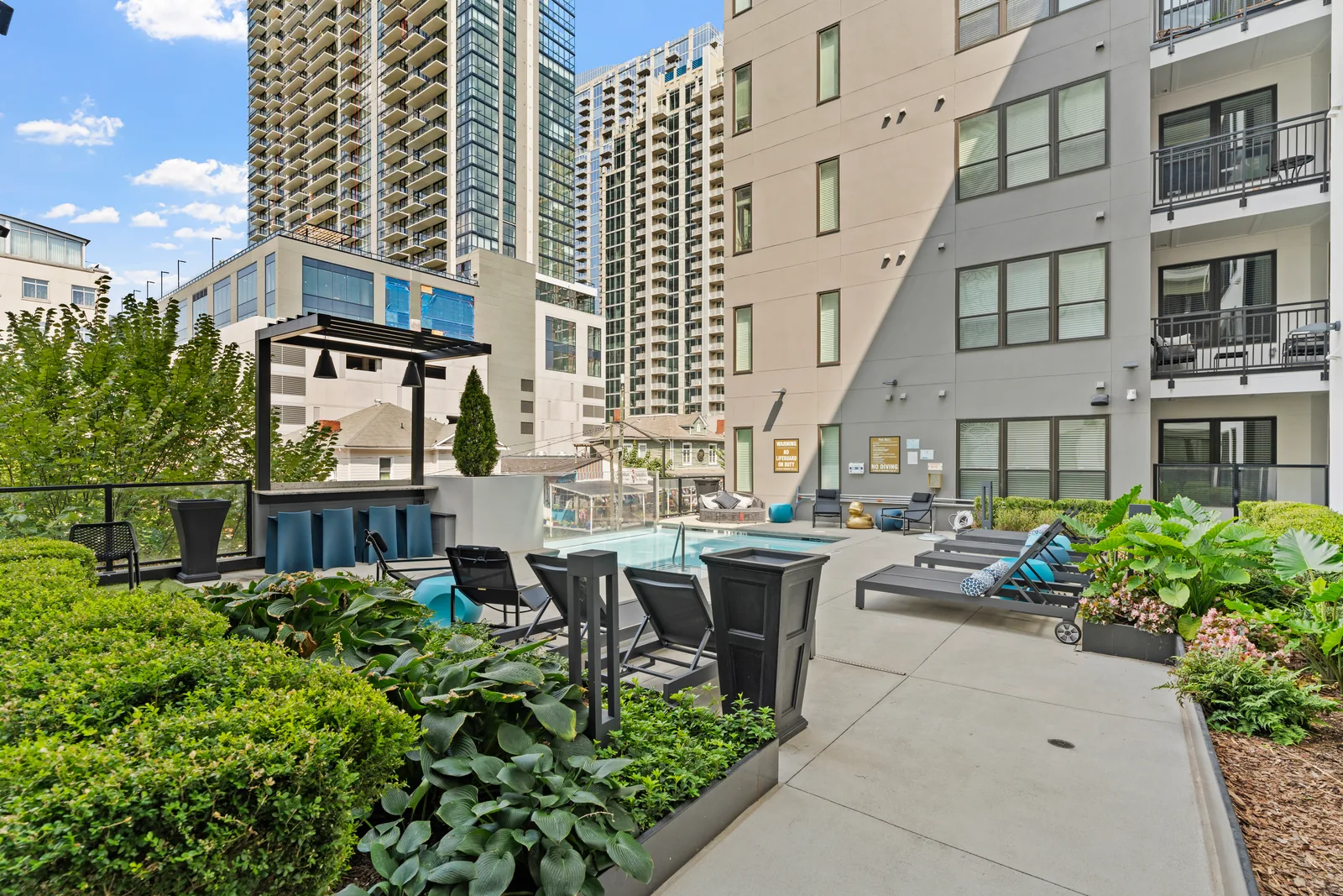 Apartment pool courtyard with surrounding high-rises