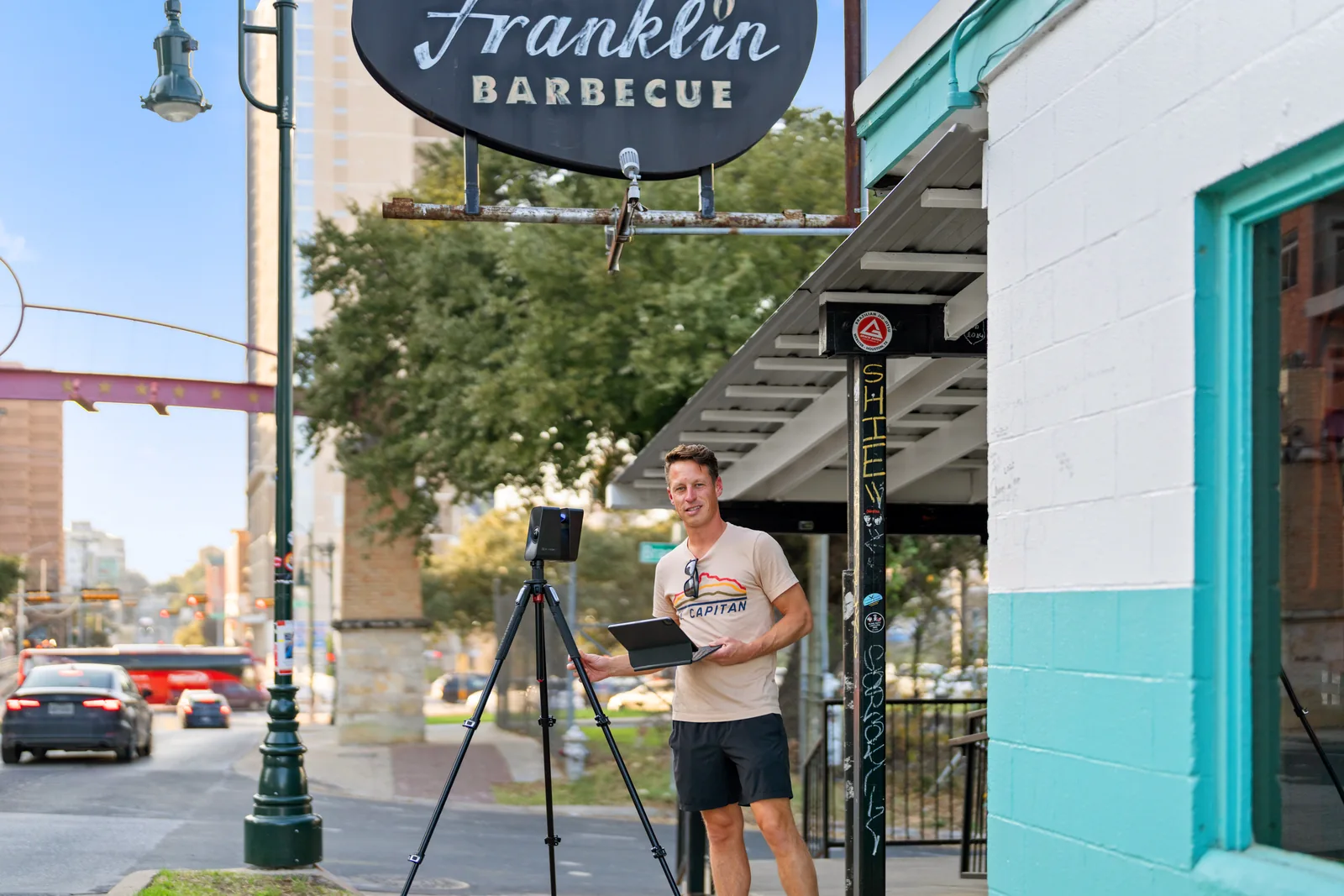 Photographer with a camera setup outside Franklin Barbecue