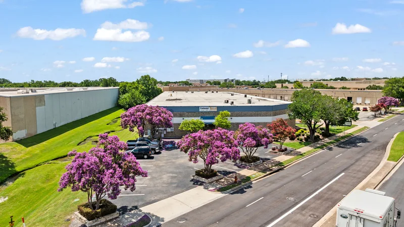 Commercial building and landscaped road viewed from above