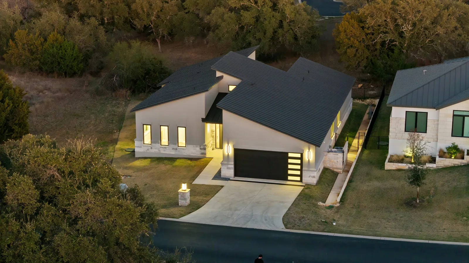 Home exterior photographed in the blue hour