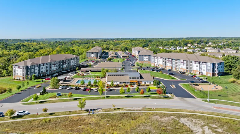 Aerial overview of a landscaped apartment community