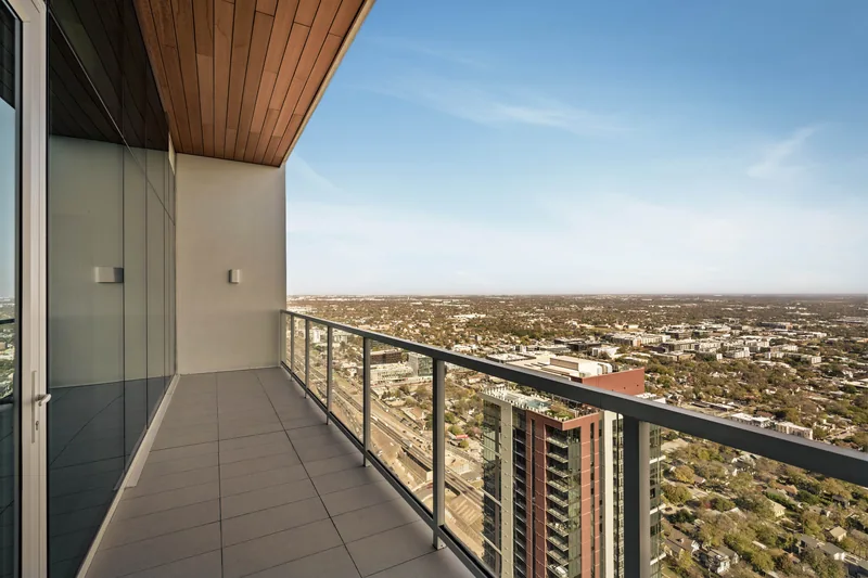 High-rise apartment balcony overlooking the city