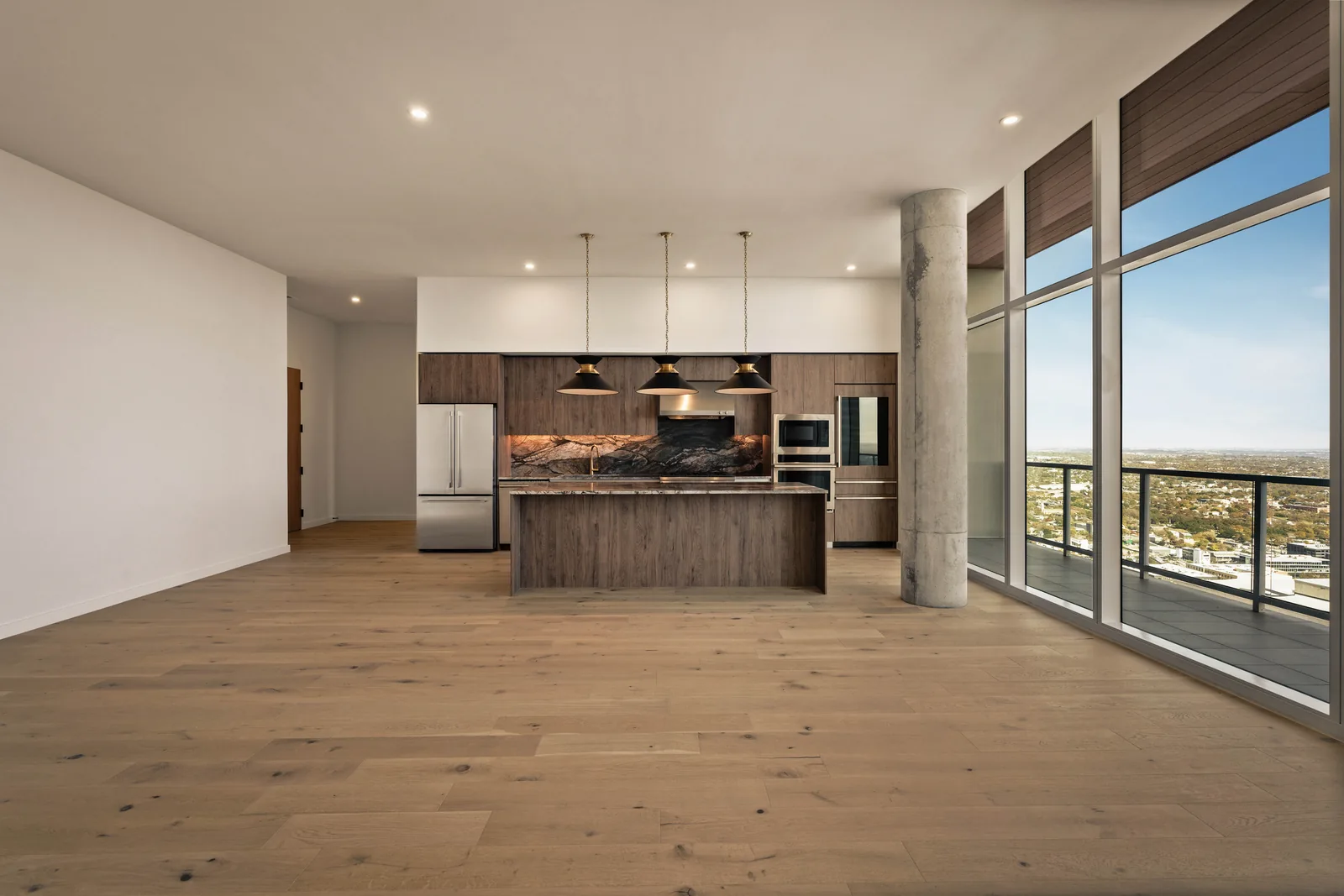 High-rise kitchen and living space with an Austin view