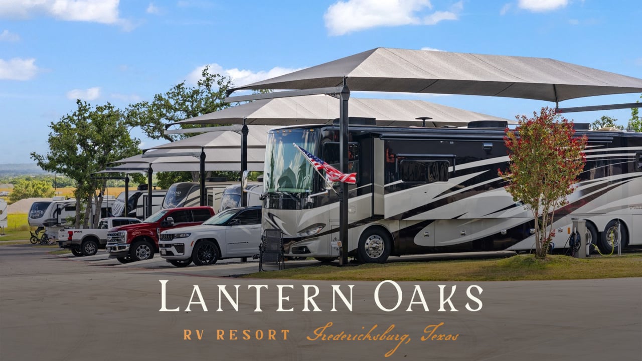 RV sites with shade structures at Lantern Oaks RV Resort