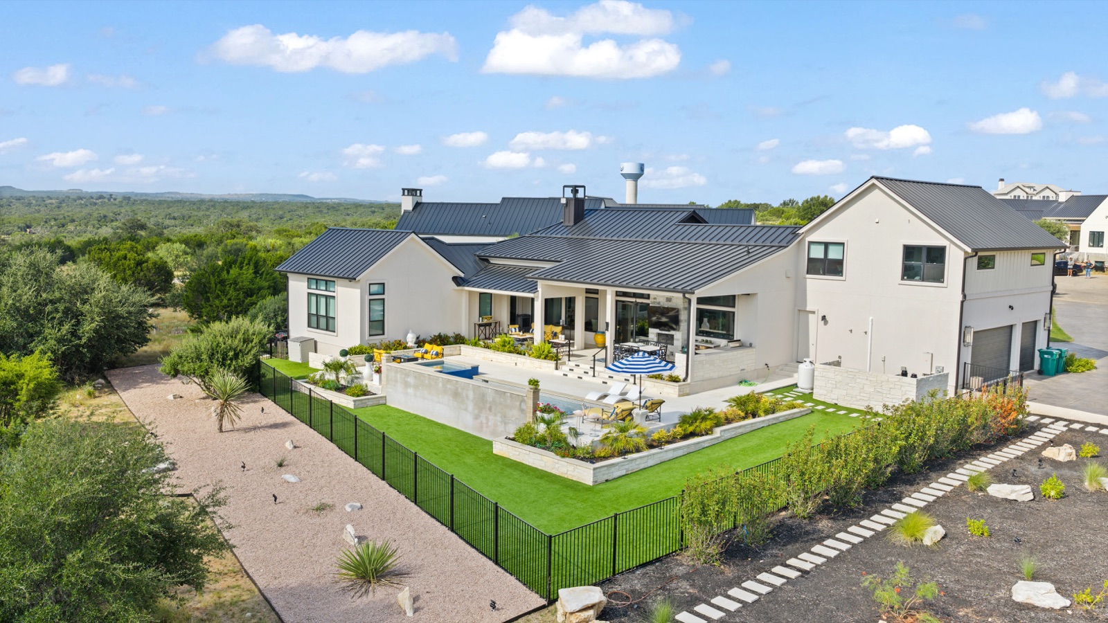 Aerial view of a home and landscaped grounds