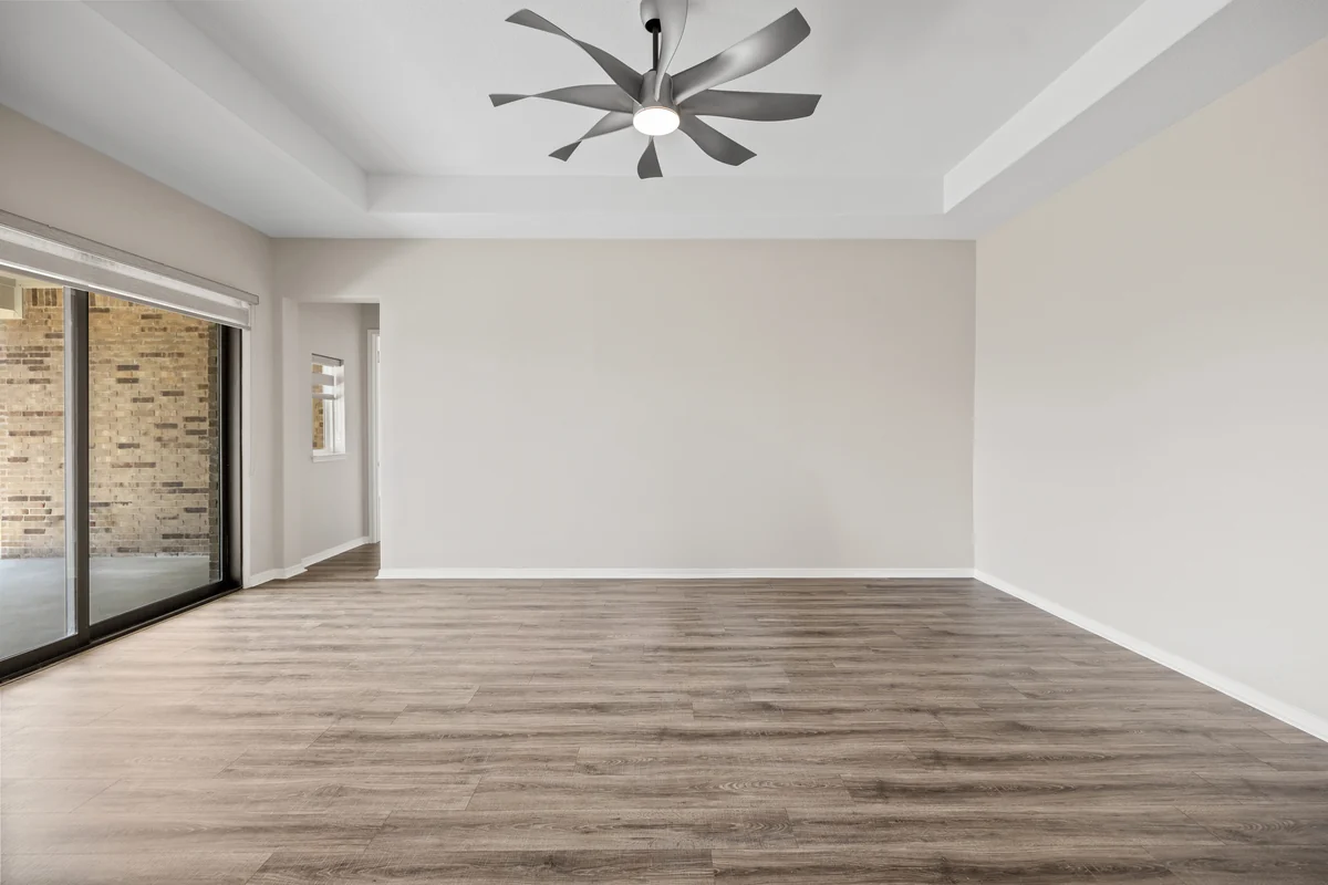 An empty living room before virtual staging