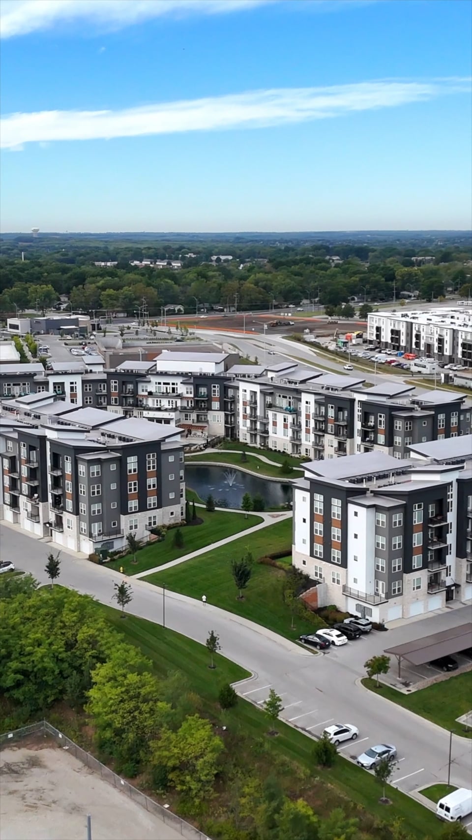 Aerial view of an apartment community and its grounds