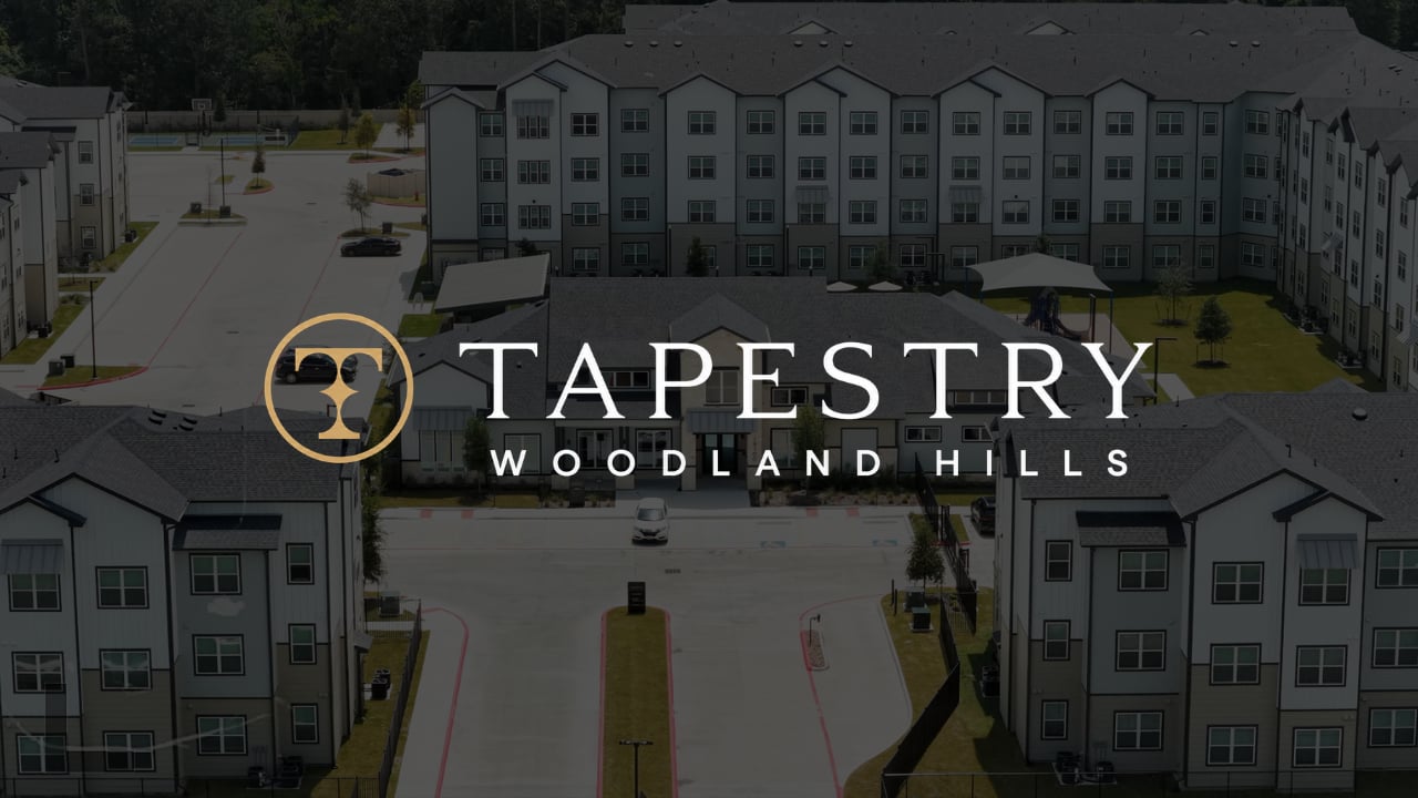Aerial view of the Tapestry Woodland Hills apartment buildings in the property film poster