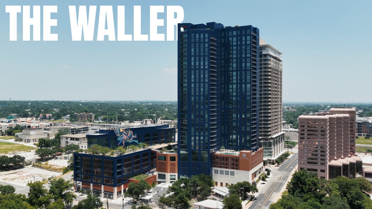 The Waller apartment tower and surrounding city in the property film poster