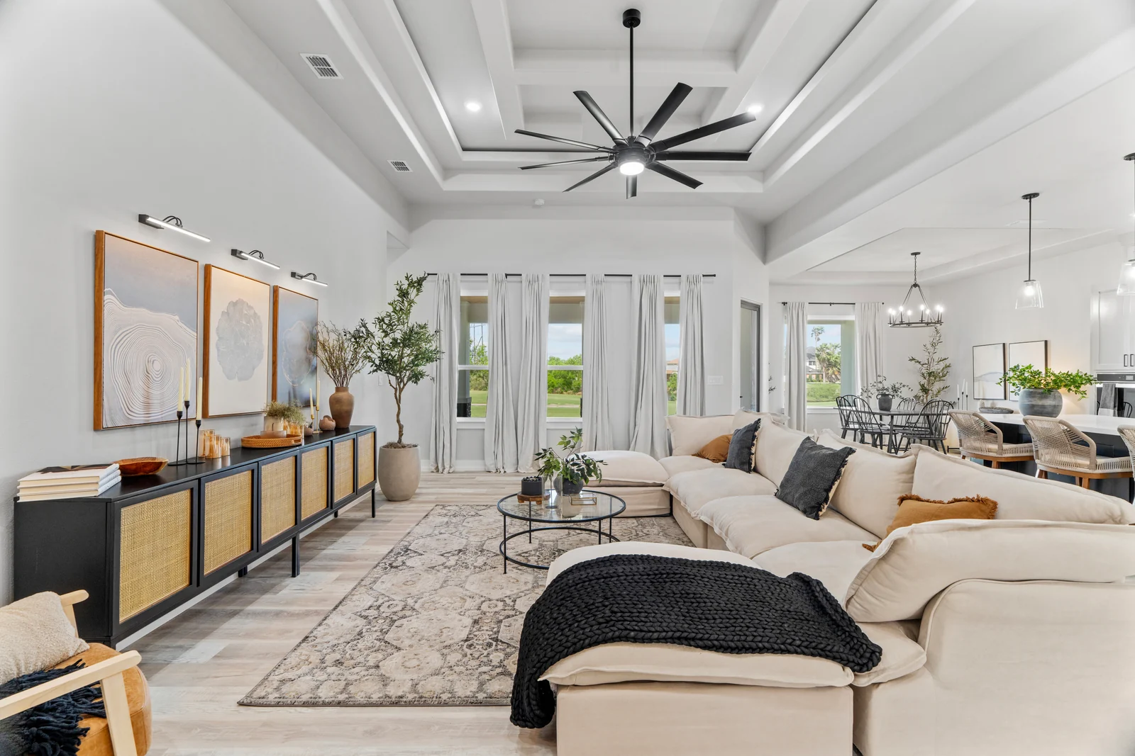 Bright open living space with a view of the surrounding garden