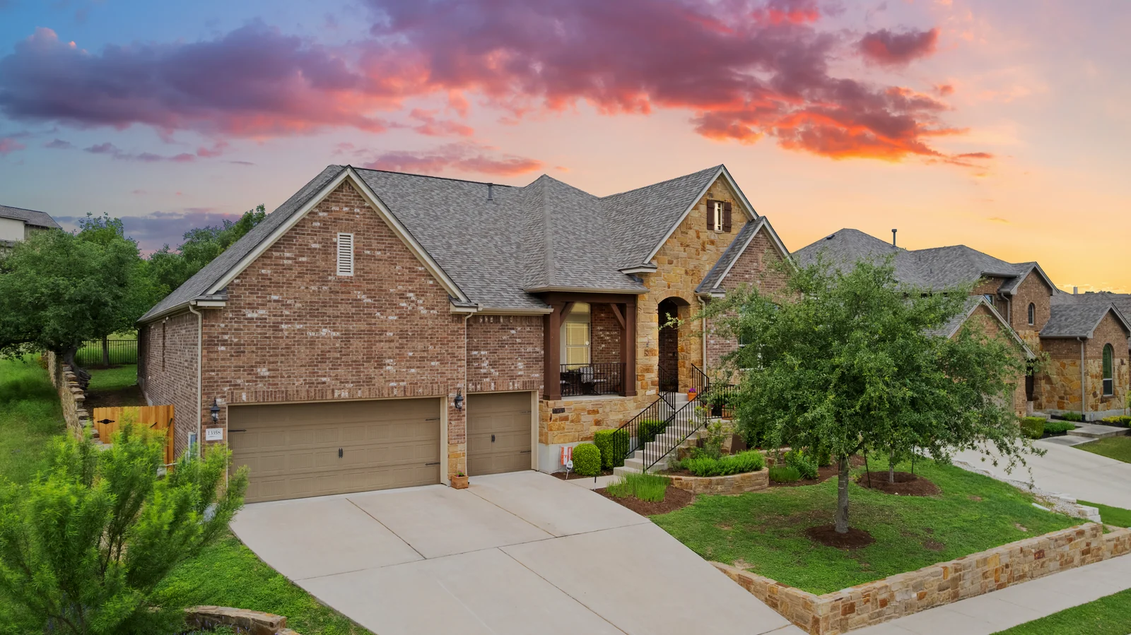 Mesa Verde home after digital twilight conversion, with a sunset sky and glowing windows