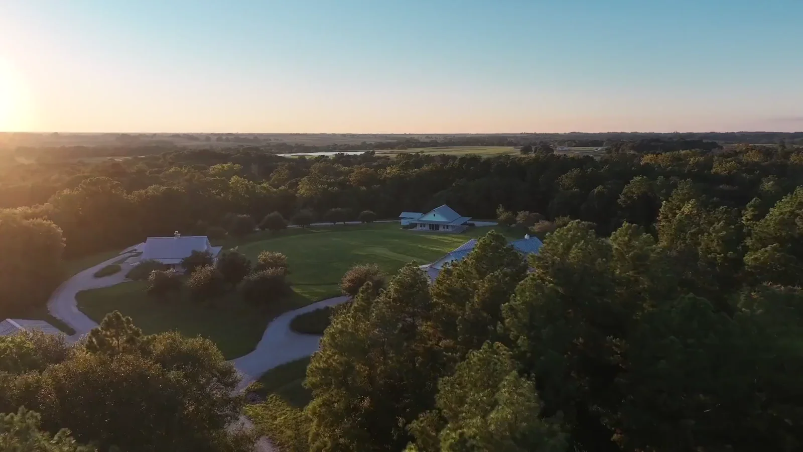 Sunset aerial view of a Texas ranch, captured in a property film