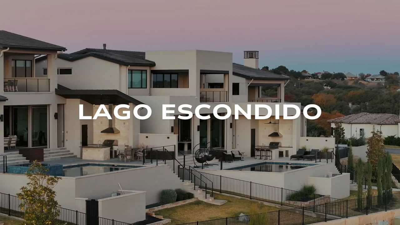 Lago Escondido waterfront home at dusk, from the property film