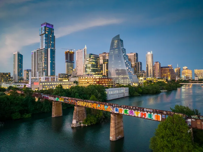 Austin skyline and railroad bridge across the river