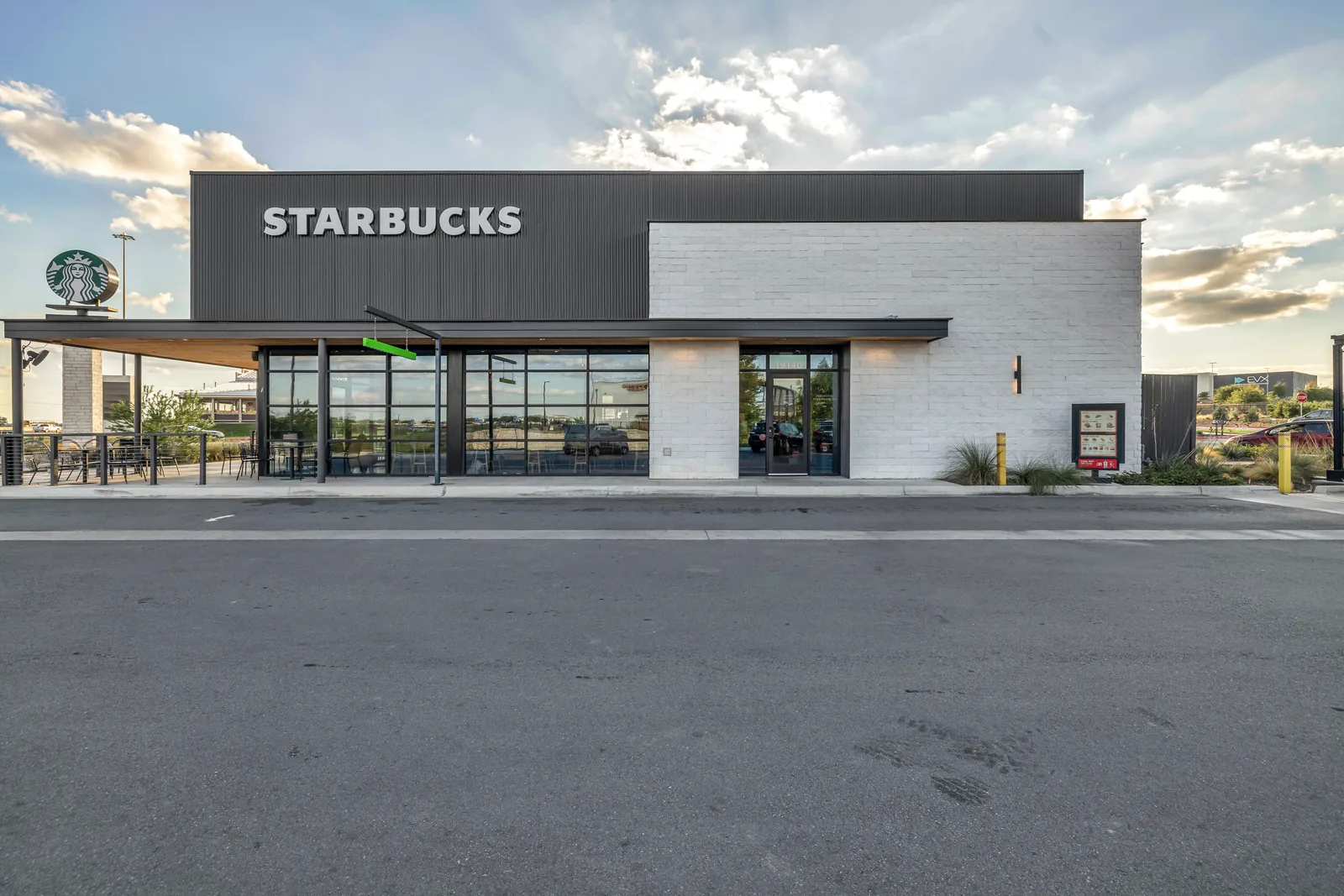Starbucks retail building exterior in evening light