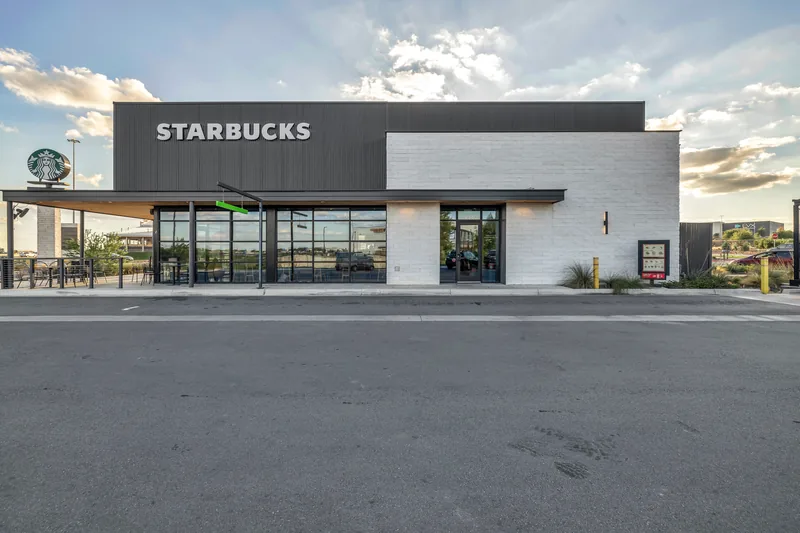 Starbucks retail building exterior in evening light